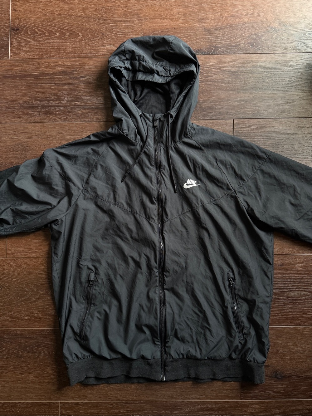 Nike Black Hooded Windbreaker with White Swoosh